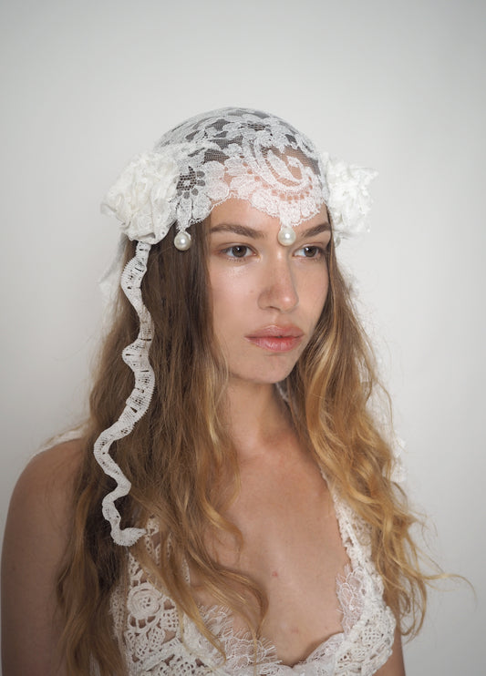 White pearls and lace headpiece