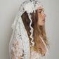 White pearls and lace headpiece