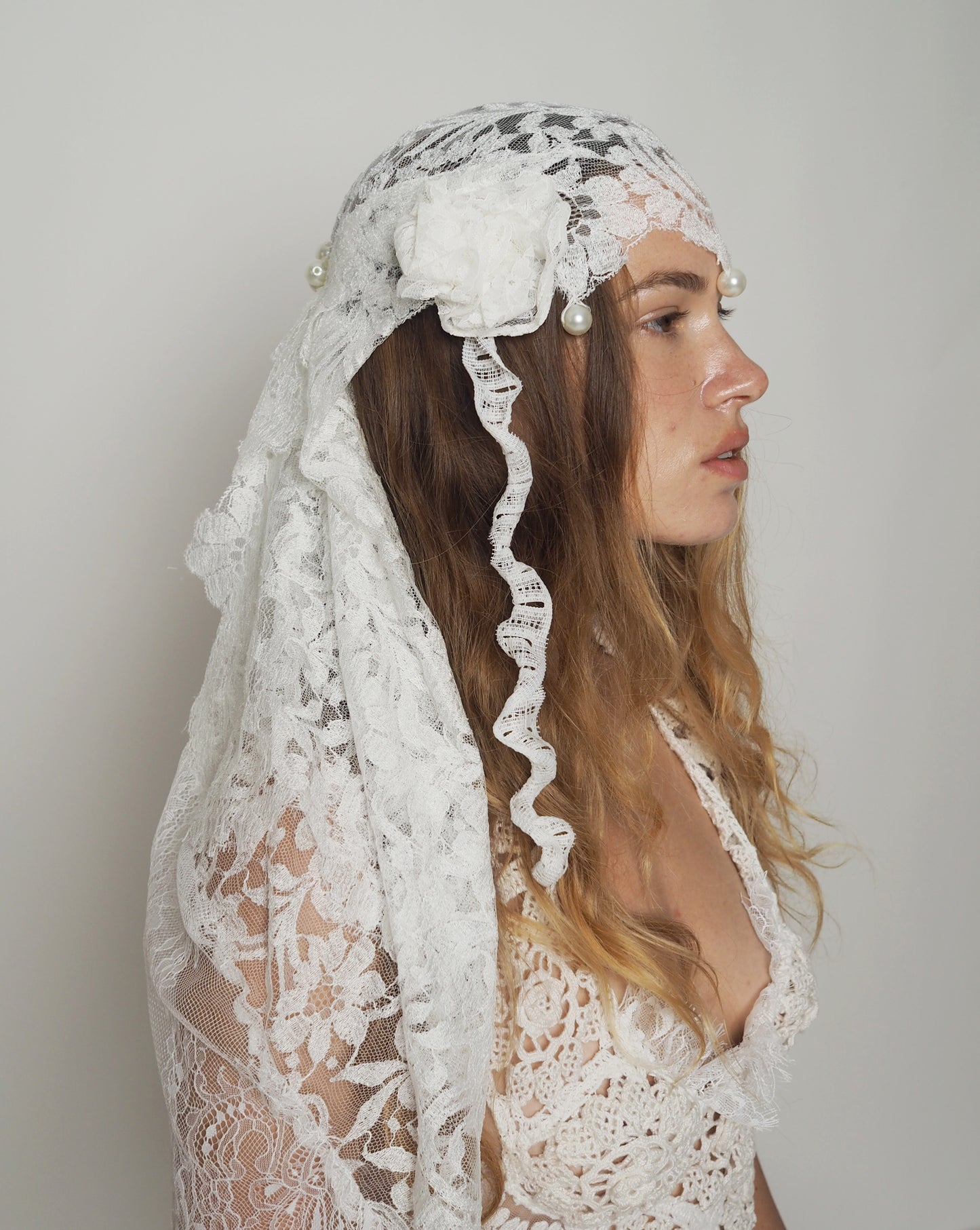 White pearls and lace headpiece