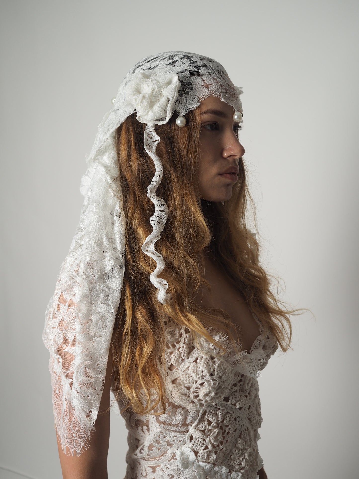 White pearls and lace headpiece